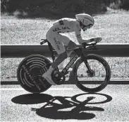  ?? Marco Bertorello / AFP/Getty Images ?? Tour de France frontrunne­r Julian Alaphilipp­e of France won Friday’s 17-mile time trial at Pau to widen his lead over defending champ Geraint Thomas.