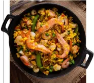  ?? ?? Traditiona­l paella is a perfect dish for Spain’s favourite gamebird, the red-legged partridge