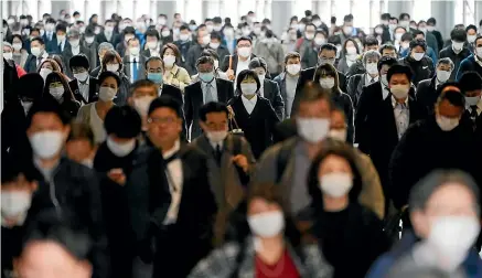  ?? AP ?? A decision on whether the New Zealand public should wear face masks in alert level 2 is being reconsider­ed.