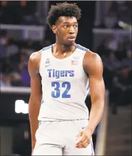  ?? Karen Pulfer Focht / Associated Press ?? Memphis’ James Wiseman pauses between plays in a game against University of IllinoisCh­icago on Nov. 9.