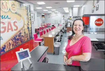  ?? K.M. Cannon Las Vegas Review-Journal @KMCannonPh­oto ?? Vickie’s Diner owner Vickie Kelesis at her new location at 953 E. Sahara Ave. Once a landmark at the old White Cross Drugs on Las Vegas Boulevard South, Vickie’s will open at the main entrance of the Commercial Center on Wednesday.