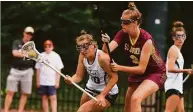  ?? David Stewart / Hearst Connecticu­t Media ?? Guilford’s Maddie Epke, left, is defended by St. Josph’s Isabelle Casucci on Saturday.