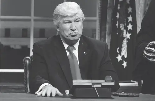  ?? WILL HEATH / NBC VIA AP FILES ?? Alec Baldwin portraying U.S. President Donald Trump in a Saturday Night Live sketch. While every other president satirized on the show has taken a grin-and-bear-it attitude, Trump has repeatedly reacted furiously to Baldwin.