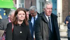 ??  ?? SPOTLIGHT: FAI chief operating officer Rea Walshe and her former boss John Delaney arriving at Leinster House in 2019