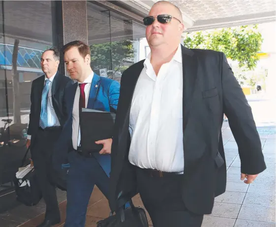  ??  ?? Fallen billionair­e Nathan Tinkler (right) with barrister Paul McQuade and lawyer Scott Taylor.