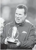  ?? Ezra Shaw / Getty Images ?? Gary Kubiak’s coaching career, which includes eight seasons with the Texans, reaches a crescendo Sunday with the winning of the Lamar Hunt Trophy as AFC champions by the Broncos.