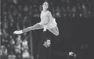  ?? SEAN KILPATRICK/THE CANADIAN PRESS ?? Canadians Meagan Duhamel and Eric Radford begin their farewell tour at Skate Canada Internatio­nal in Regina.