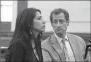  ?? AP/JEFFERSON SIEGEL ?? Former U.S. Rep. Anthony Weiner and his estranged wife, former Hillary Clinton aide Huma Abedin, appear in court in New York on Wednesday. The couple asked a New York City judge for privacy in their divorce case.