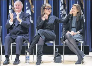  ?? CP PHOTO ?? Former prime minister Brian Mulroney, left, applauds as his wife Mila, centre, affectiona­tely acknowledg­es their daughter, Caroline Mulroney Lapham, during the announceme­nt of the $60-million Brian Mulroney Institute of Government and Mulroney Hall at...