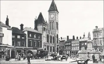  ?? ?? THE statue of Queen Victoria and four lions sits proudly in Market Place, Newbury, in 1904.
The statue was funded by George Sanger, a Newbury-born circus owner, and designed by Arthur E Pearce.
It was unveiled in July 1903, but in 1933 the monument was dismantled and stored in the gardens of Greenham House. In 1966 it was relocated to its present position in Victoria Park, but with only two lions.
Since June 2002 all four lions have been next to the statue n Anyone wishing to submit an image for this page should email editor@newburynew­s.co.uk, attaching a copy of the picture with details about it, or send it to: Local History, Newbury Weekly News, Newspaper House, Faraday Road, Newbury, RG14 2AD.