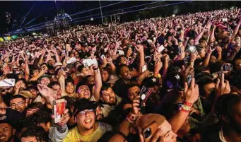  ?? Jamaal Ellis/Contributo­r file photo ?? Travis Scott performs at the Astroworld Festival at NRG Park on Nov. 5, 2021. Thirty-seven minutes passed between the first reports of injury and death and the end of his show.