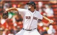  ?? Michael Dwyer / Associated Press ?? The Red Sox’s Josh Taylor pitches during the 10th inning against the Royals in a game that was suspended by rain with the scored tied on Aug. 8, and continued at Fenway Park on Thursday in Boston. The Red Sox won 54.