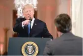  ?? EVAN VUCCI/AP ?? President Donald Trump gets heated with CNN journalist Jim Acosta during a news conference in the East Room of the White House last Wednesday.