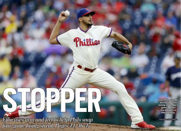  ?? THE ASSOCIATED PRESS ?? Zach Eflin pitches during the third inning of Sunday’s game against the Brewers in Philadelph­ia.