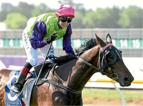  ??  ?? Sam Spratt rides Gobstopper to victory in the 154th running of the New Zealand Cup.