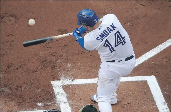  ?? — GETTY IMAGES FILES ?? Justin Smoak’s success can be credited to the fact he’s ’swinging at his pitch instead of swinging at the pitcher’s pitch.’