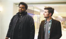  ?? Kevin Estrada / Fox ?? Craig Robinson (left) and Adam Scott play unlikely recruits on a mission, and make a winning comedy duo that helps to carry the new sitcom “Ghosted.”