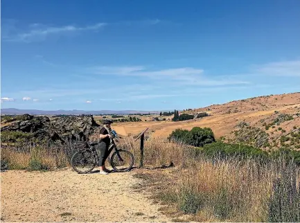  ?? PHOTO: JACK FLETCHER/STUFF ?? E-bikes make traversing the Otago Rail Trail an absolute breeze.