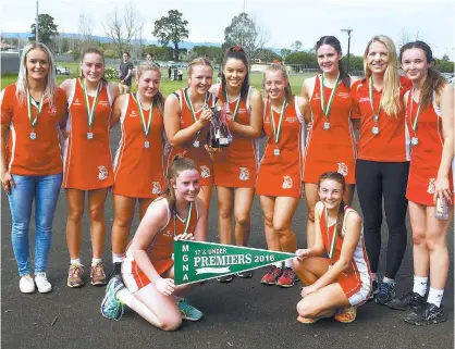  ??  ?? Trafalgar under 17s took out the premiershi­p after a tough match against Yinnar on Saturday. With the cup and flag in hand (from left) coach Megan Hancock, Nicole Faltum, Grace Matthews, Montanna Malady, Gabby Misuraca, Hannah Templeton, Katrina Marx,...