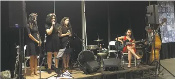  ??  ?? The four young leaders — Naama Shlomy, Sana Zahalka, Liza Masri and Shay Keidar — sing a song in English, Arabic and Hebrew at the Saalam-Shalom fundraiser.
