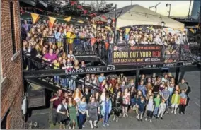  ?? PHOTO PROVIDED BY NEIL GRABOWSKY ?? More than 230 redheads appeared at the annual event Wednesday night.