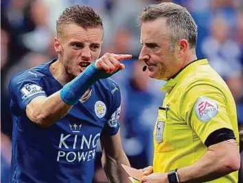  ?? AP ?? Leicester City’s Jamie Vardy gestures to referee Jonathan Moss after being sent off in the league match against West Ham United on Sunday. Vardy faces a two-match ban.