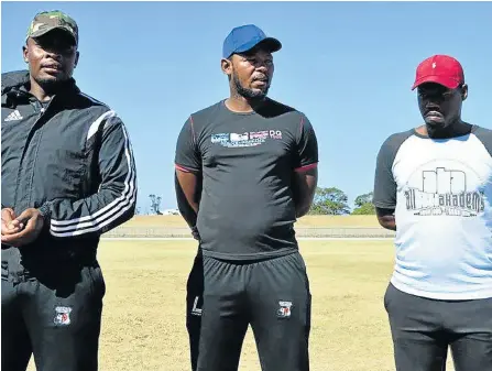  ?? Picture: RANDELL ROSKRUGE ?? OFF THE SCRIPT: Former Tornado coach Tshepo Motsoeneng, flanked by former assistant Vuyisani Mangaliso and new caretaker coach Simphiwe Magongo.