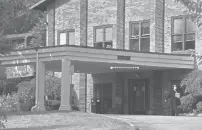  ?? BRAD HORRIGAN/HARTFORD COURANT ?? A person leaves Three Rivers Healthcare in Norwich on Sept. 16. The state announced that day that the nursing home facility would close after several COVID-19 deaths.