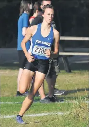  ?? KEN SWART — MEDIANEWS GROUP ?? Rochester’s Chloe Nixon rounds the corner on her way to victory in the dual meet with Troy Athens held at Bloomer Park in Rochester on Wednesday.