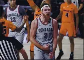  ?? YOUNG KWAK — THE ASSOCIATED PRESS ?? Gonzaga forward Drew Timme celebrates after scoring a basket during the first half against Pacific on Saturday.