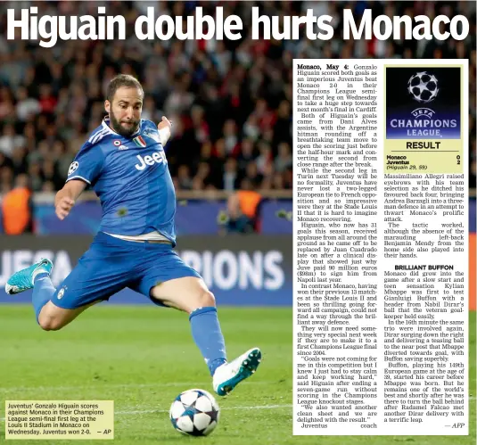  ?? — AP — AFP ?? Juventus’ Gonzalo Higuain scores against Monaco in their Champions League semi-final first leg at the Louis II Stadium in Monaco on Wednesday. Juventus won 2-0.
