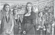  ?? AIMEE SPINKS, STARZ ENTERTAINM­ENT ?? The White Princess, Elizabeth of York (Jodie Comer, center, in red), with Cecily of York (Suki Waterhouse), the Dowager Queen (Essie Davis) and Maggie (Rebecca Benson). Elizabeth was in love with possibly dead Richard.