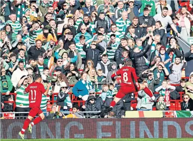  ?? ?? Steven Gerrard celebrates in front of the Celtic support after putting the Liverpool Legends ahead