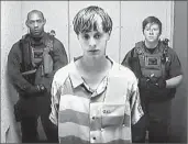  ?? Associated Press ?? CHURCH shooting suspect Dylann Roof appears via video Friday before a judge in Charleston, S. C.