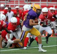  ?? RANDY MEYERS — FOR THE MORNING JOURNAL ?? Avon’s Cole Zambursky breaks through the Elyria defense for a touchdown run during a scrimmage Aug. 17.