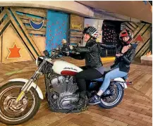  ??  ?? Tanya Piejus with her Harley-Davidson 883 Sportster, at right, and above, with stage manager Brynne Tasker-Poland in the lead-up to the Summer Shakespear­e production of All’s Well that Ends Well. Photo: TABITHA ARTHUR