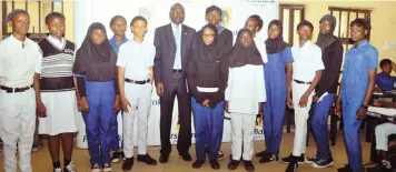  ?? Photo: FBN ?? Abdullahi Ibrahim, Executive Director, Retail North, First Bank of Nigeria Limited (middle) with students of the Government Science Technical College Garki Abuja, during FirstBank’s Career Counseling Day at the school in commemorat­ion of FirstBank’s...