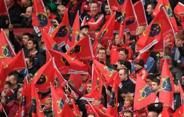  ??  ?? A SAD FAREWELL: Simon Zebo was in tears and Munster supporters wave their flags ahead of yesterday’s match at Thomond Park. Photos: Brendan Moran.