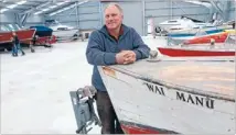  ??  ?? Under cover: Pat Gelling in the new boat storage building.