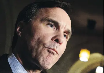  ?? SEAN KILPATRICK / THE CANADIAN PRESS ?? Minister of Finance Bill Morneau is not expected to include a hike in defence spending in Wednesday’s budget.