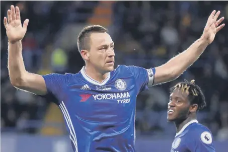  ??  ?? Emotional farewell ahead: John Terry marks his 67th Chelsea goal in Monday’s 4-3 win over Watford.