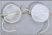  ??  ?? Gandhi’s glasses photograph­ed ahead of their sale. — AFP photo