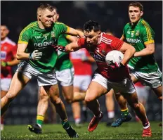  ??  ?? PUSH OFF: Cork’s Sean Powter with Meath’s Conor McGill; (left) McGill’s joy