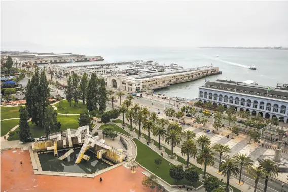  ?? Gabrielle Lurie / The Chronicle ?? The Vaillancou­rt Fountain was installed along the Embarcader­o in the days when an elevated freeway dominated the landscape, separating the city from the bay.