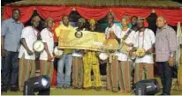  ??  ?? Ayan-Gbayi Group, winner of the first prize in the Goldberg Excellency Tour at Ado-Ekiti being presented with a cheque of N250, 000