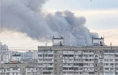  ?? REUTERS ?? Smoke rises from a building after a Russian missile strikes Kyiv yesterday.