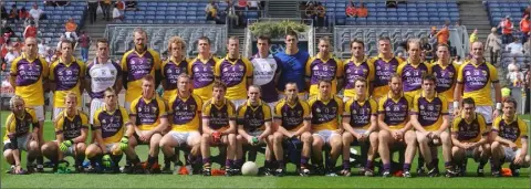  ??  ?? Brian Malone and the Wexford squad on a day that will live long in the memory - the 1-14 to 0-12 All-Ireland quarter-final victory over Armagh in Croke Park on August 9, 2008. Back (from left): Philip Wallace, Garry Murphy, Gavin Morris, Brendan Doyle, Collie Byrne, David Murphy, Paddy Colfer, Anthony Masterson, Thomas Howlin, Matty Forde, Brian Malone, Nicky O’Sullivan, Tom Wall, David Walsh, Gary Brilly. Front (from left): Ben Brosnan, Niall Murphy, Adrian Flynn, Aindreas Doyle, P.J. Banville, Redmond Barry, Colm Morris (capt.), Adrian Morrissey, Ciarán Lyng, George Sunderland, Rory Stafford, Michael Hanrahan, Shane Roche, Ciarán Deely.
