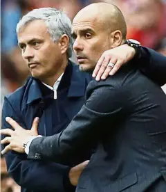  ?? — Reuters ?? Tactical showdown: Manchester United manager Jose Mourinho (left) with his Manchester City counterpar­t Pep Guardiola.