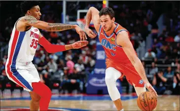  ?? PAUL SANCYA/ AP 2020 ?? Hawks new forward Danilo Gallinari ( right) averaged 18.7 points, 5.2 rebounds and 1.9 assists in 29.6 minutes last season for the Thunder. He also shot 89.3% from the free- throw line, the sixth- best in the league.