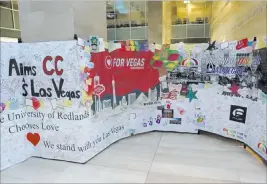  ??  ?? Handwritte­n cards, panels and notes from across the country and world make up the Hearts for Vegas display on the second floor of Las Vegas City Hall. Notes came from as far away as India and New Zealand.